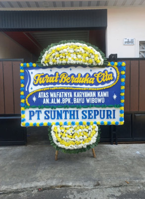 Papan Bunga Duka di Pantai Barat