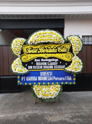 Papan Bunga Duka di Pantai Barat