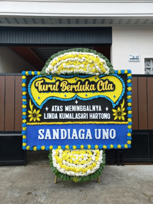 Papan Bunga Duka di Pantai Barat